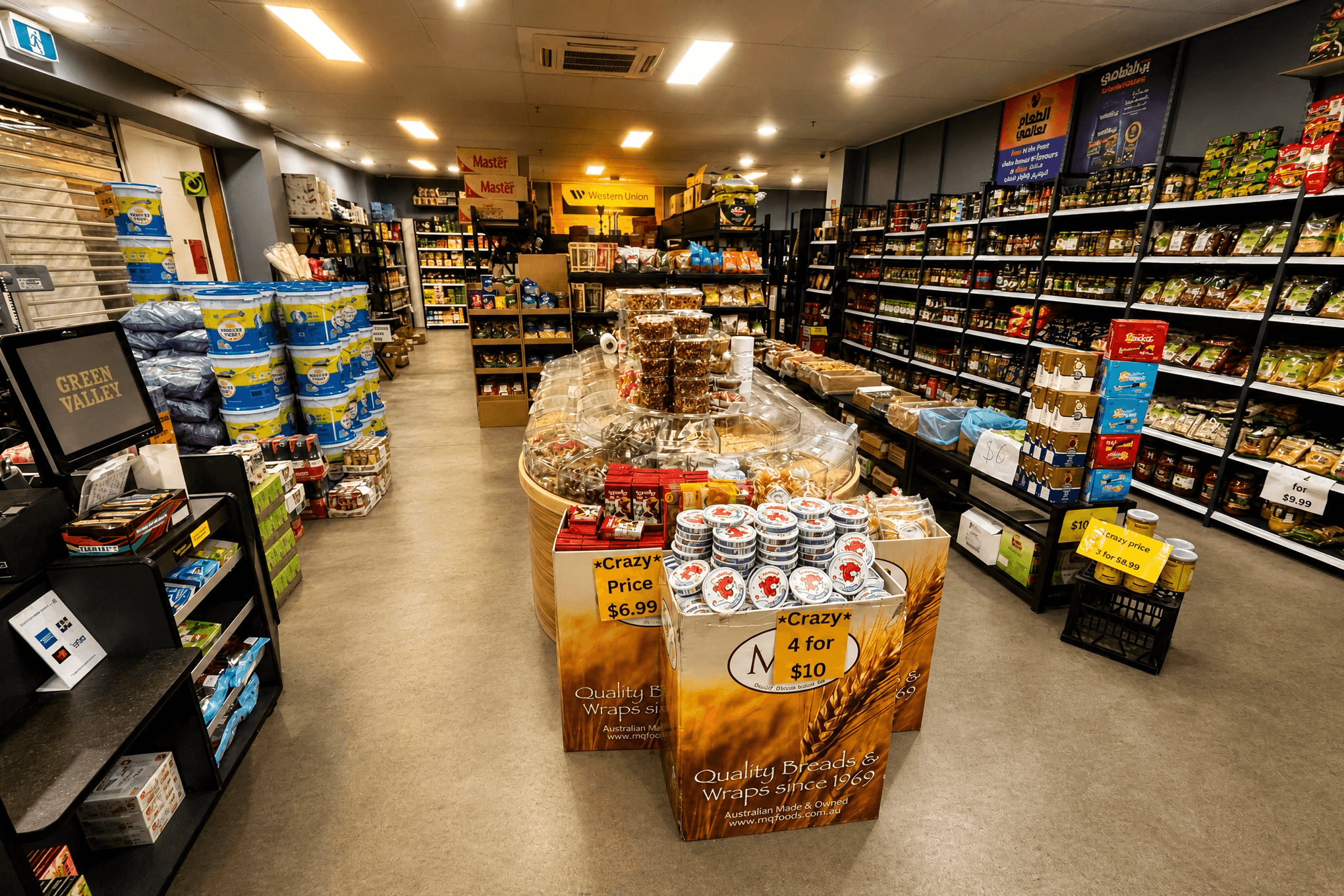 Inside Green Valley Wholesale Supermarket — well-stocked aisles of grocery products